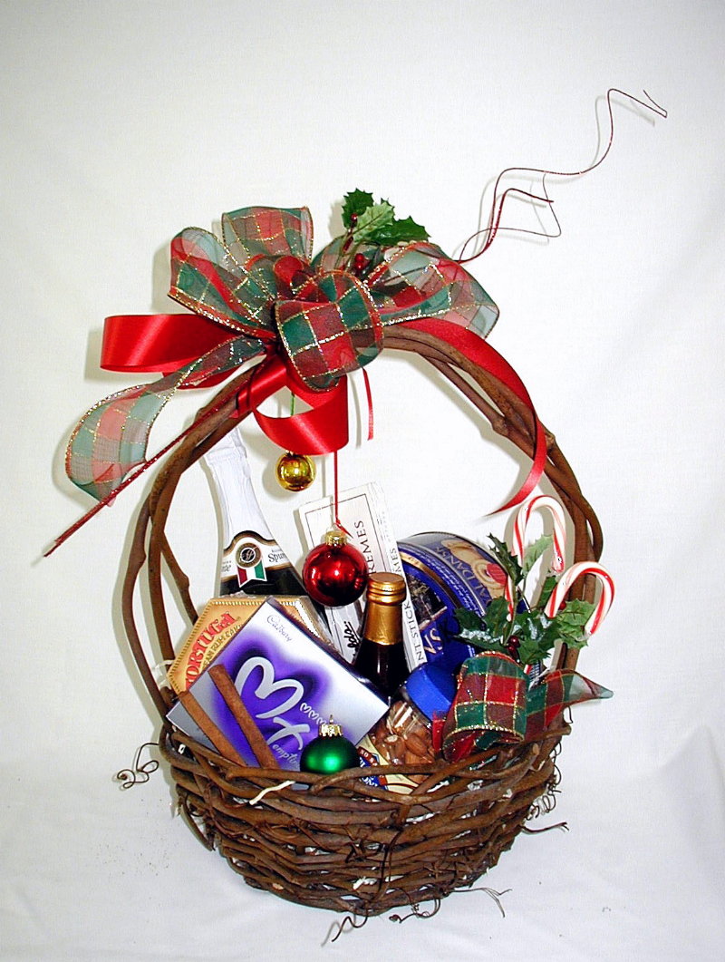 Decorative gift basket with chocolates and treats arranged by Victoria Florist in Barbados.